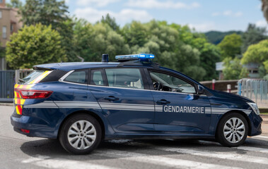 French gendarmerie patrol car parked on a small street