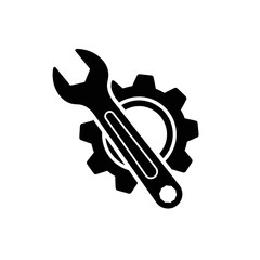 Black silhouette icon depicting a wrench and a gear, symbolizing settings, tools, and mechanical work or engineering.