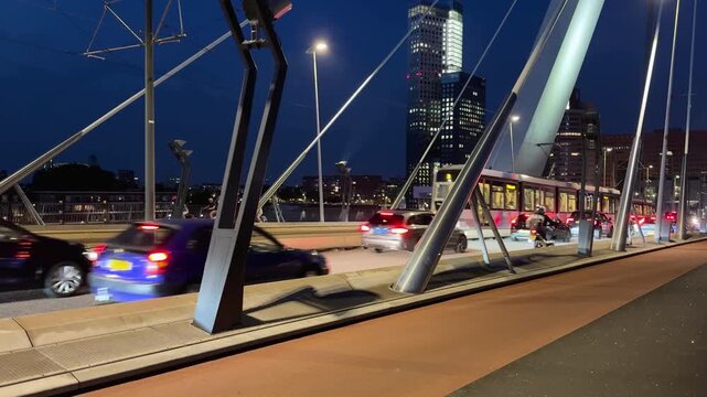 Cars Traffic on Erasmus Bridge at Night