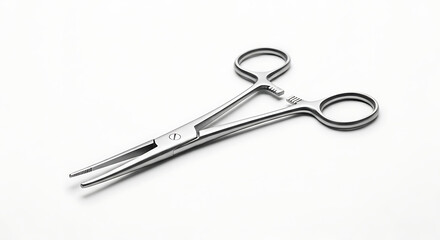 Obraz premium Close up of stainless steel surgical hemostat lying on a white surface in a studio shot ai generated