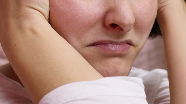 Upset and depressed Caucasian brunette woman close up