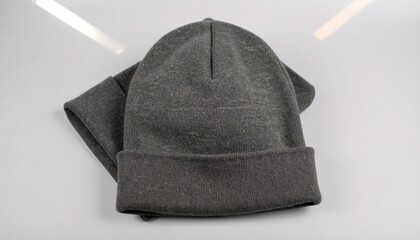 Gray Beanie Hat on White Winter Clothing with Warm, and Isolated Studio.