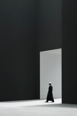 Obraz premium A man in a long coat walks through a modern minimalist space. Ideal for design, fashion, and architecture projects.