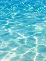 The particles vary in size, with some appearing as tiny specks and others as larger, glowing orbs, giving a sense of depth and movement. The light interacts with the particles, creating subtle bokeh e