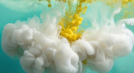 Yellow and white ink swirling in turquoise water abstract background