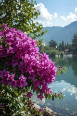 Vibrant Purple Flowers Overlooking Serene Mountain Lake Landscape