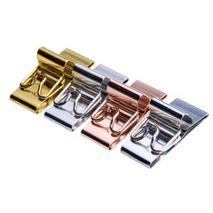 Elegant metallic binder clips in gold, silver, and rose gold offer sophisticated organization for modern offices and stylish home workspaces.