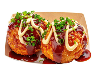Two takoyaki balls on a paper plate, topped with mayonnaise, sauce, and green onions