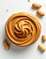 Creamy peanut butter swirl in a bowl, surrounded by peanuts on a white background
