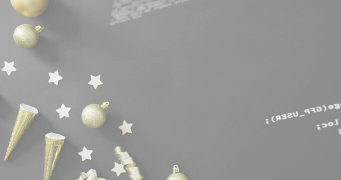 At one second code block appearing scrolling and fading twice revealing festive gold ornaments