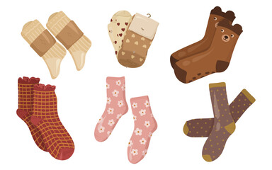 Set icon of cozy socks in different styles, colors, and patterns. Perfect for winter design, holiday cards, textile prints, seasonal branding, and hygge projects.