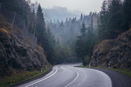 Road among old woods in Moravian-Silesian Beskids mountain range, Czech Republic, view near Stare Hamry village