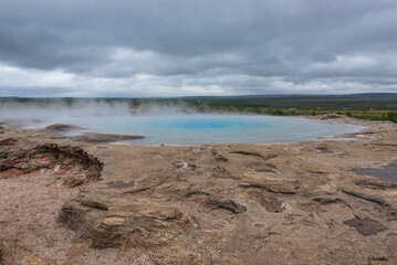 Great Geysir in Geysir geothermal area, one of the most famous tourist attractions in Iceland
