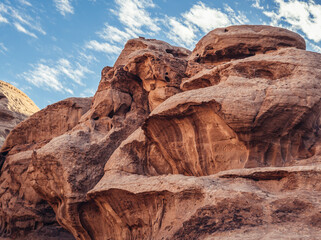 Fototapeta premium Rocks of Jabal Umm Fruth Bridge in Wadi Rum - Valley of Sand, Jordan