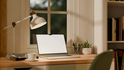 3D rendered modern workspace with laptop, desk lamp, coffee cup, and stationery in a cozy home office © Prathankarnpap
