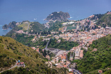 Fototapeta premium Aerial view on Taormina city seen from Castelmola, small town on Sicily Island, Italy