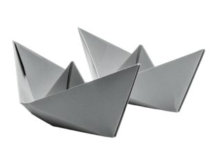 Two gray origami boats, close-up, slightly angled