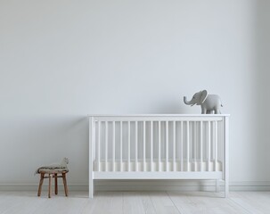 Empty white nursery with crib and elephant