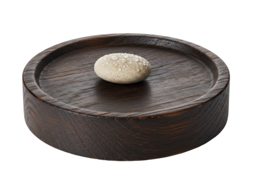 Isolated wet stone on wooden plate, spa accessories, calm scene, aromatherapy, home decor
