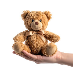 Obraz premium A plush brown teddy bear sits on an open palm adorned with a satin bow isolated on transparent background. PNG die-cut for advertising