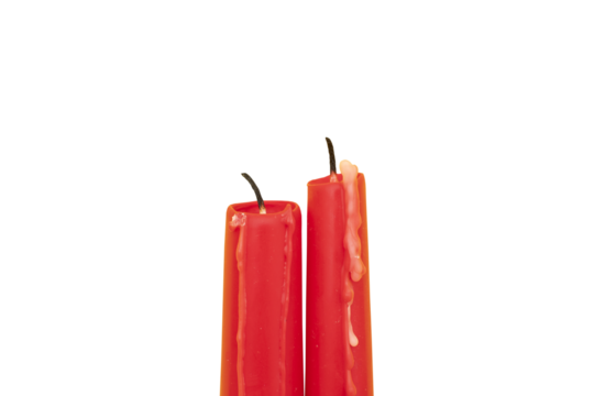 Two red candles isolated