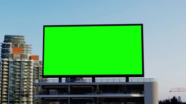 Large Green Screen Billboard on Modern Building in Cityscape.