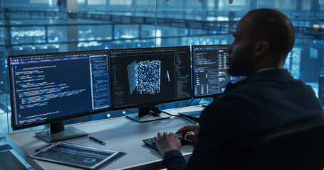 Close Up of a Black Developer in Glasses Typing Software Code, Managing Several Open Screens with AI Model Diagnostics. Professional Reviewing Output for Errors in the Data Center Office