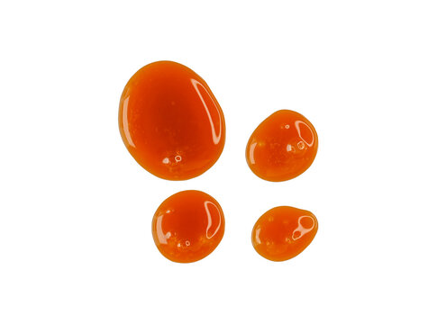 Drops of liquid caramel isolated on white, clipping path, PNG