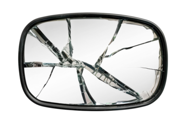 A shattered, glass panel reflects light in intricate patterns. Set against a black background, the sharp edges and fractured planes form a striking abstract design.