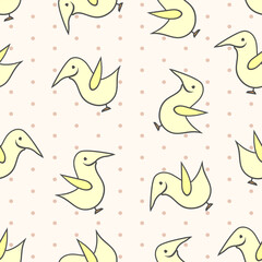 Seamless vector pattern with yellow smiling birds rotated in different directions on beige background with polka dot