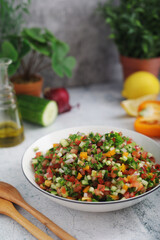 A bowl with traditional Israeli Salad