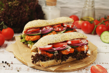 Baguette sandwiches with chicken and fresh vegetables	