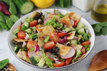 A bowl with Fattoush - Traditional Levantine salad	