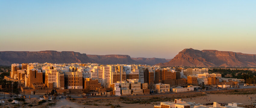 Old Walled City of Shibam, known for its mudbrick-made high-rise buildings, a world heritage site in Yemen - Powered by Adobe