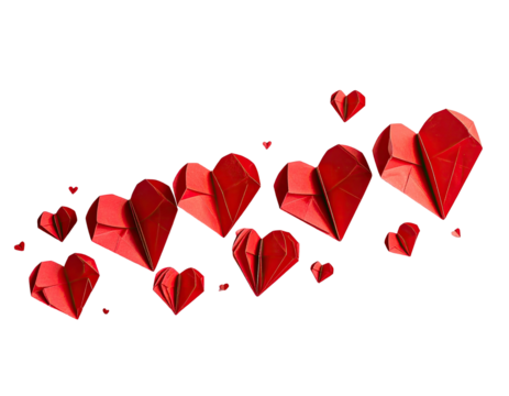 Red origami hearts, scattered, flowing, against black background