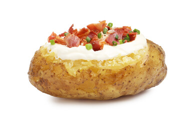 Tasty baked potato with sour cream, green onion and bacon isolated on white