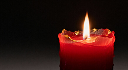  Single Burning Red Candle with Bright Flame on Dark Background