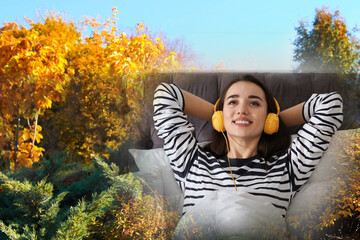 Happy woman listening to sounds of nature which making her feel calm. Double exposure of bedroom and autumn landscape