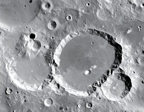 Gray lunar surface with impact craters
