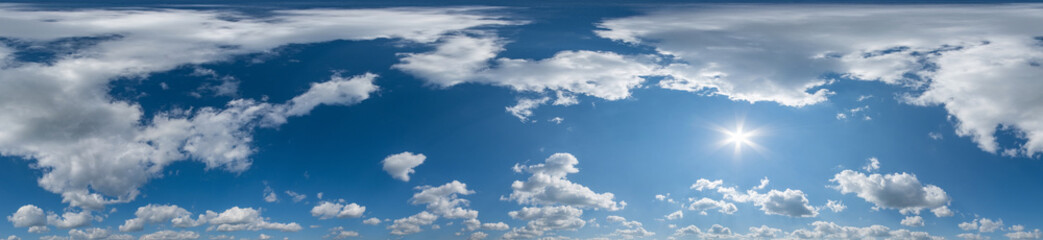 Seamless cloudy blue sky hdri panorama 360 degrees angle view with zenith and beautiful clouds for use in 3d graphics or game development as sky dome or edit drone shot