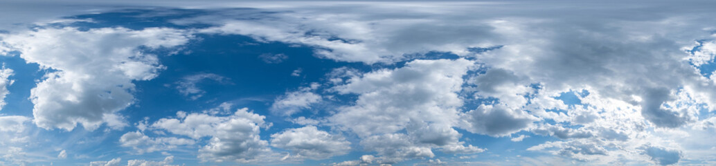 Blue sky panorama with Cirrus clouds in Seamless spherical equirectangular format. Full zenith for use in 3D graphics, game and editing aerial drone 360 degree panoramas for sky replacement.