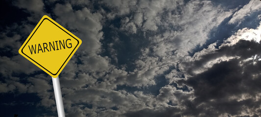 danger,caution,Hurricane Idalia warning sign against a powerful stormy background with copy space. Dirty and angled sign with cyclonic winds add to the drama.hurricane season sign on cloudy background