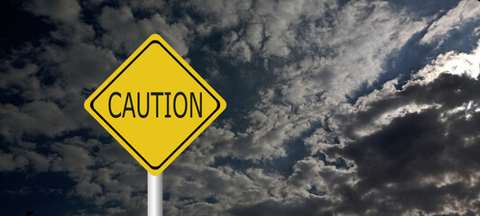 Naklejka premium danger,caution,Hurricane Idalia warning sign against a powerful stormy background with copy space. Dirty and angled sign with cyclonic winds add to the drama.hurricane season sign on cloudy background