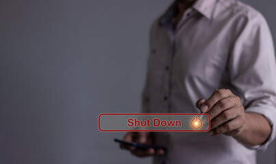 Young man with smartphone hand holding a pen touching Shut Down button press power OFF