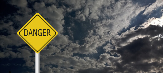 danger,caution,Hurricane Idalia warning sign against a powerful stormy background with copy space. Dirty and angled sign with cyclonic winds add to the drama.hurricane season sign on cloudy background