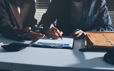 Lawyer explained to the client about the law that must be brought against the court case.