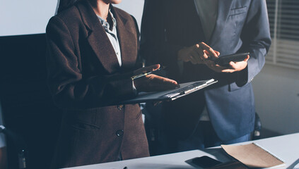 Fototapeta premium Lawyer explained to the client about the law that must be brought against the court case.