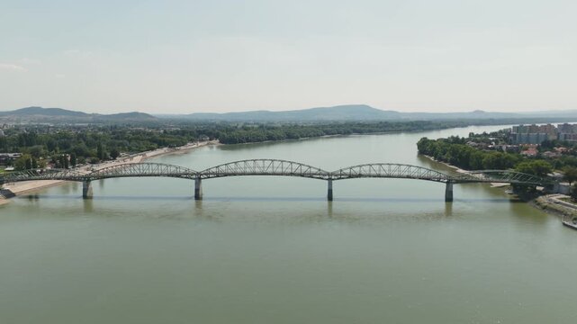 Drone approach of the M&aacute;ria Val&eacute;ria Bridge, capturing the elegant architecture of this Danube crossing between Hungary and Slovakia