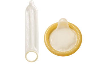 Condom in unfolded form on a white background. Contraceptive. Medical and educational topic.