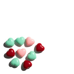 Obraz premium Nine slightly different mint, baby pink, and red hearts with a metal feel